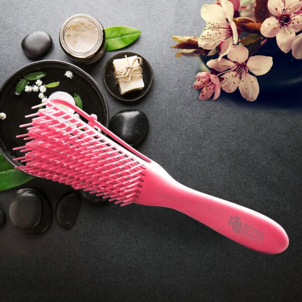 Pink detangling hair brush