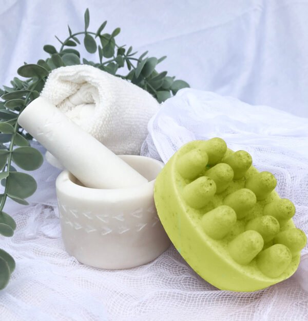 Green color Bar of Soap with mortar and pestle