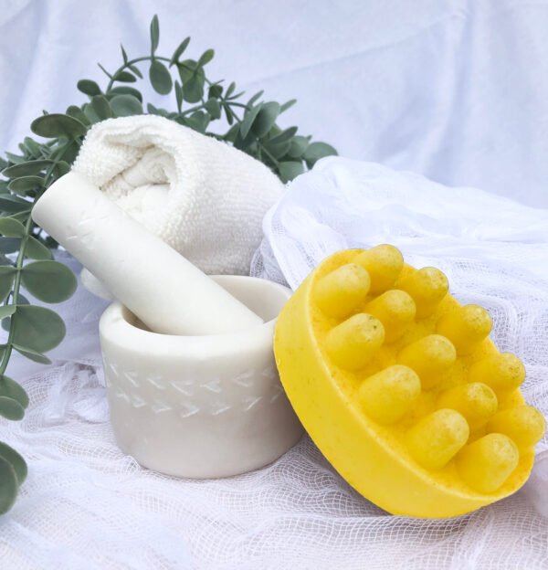 Yellow color Bar of Soap with motar and pestle